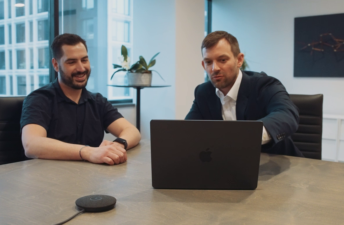 Attorney Shawn Wanta collaborating with a client 